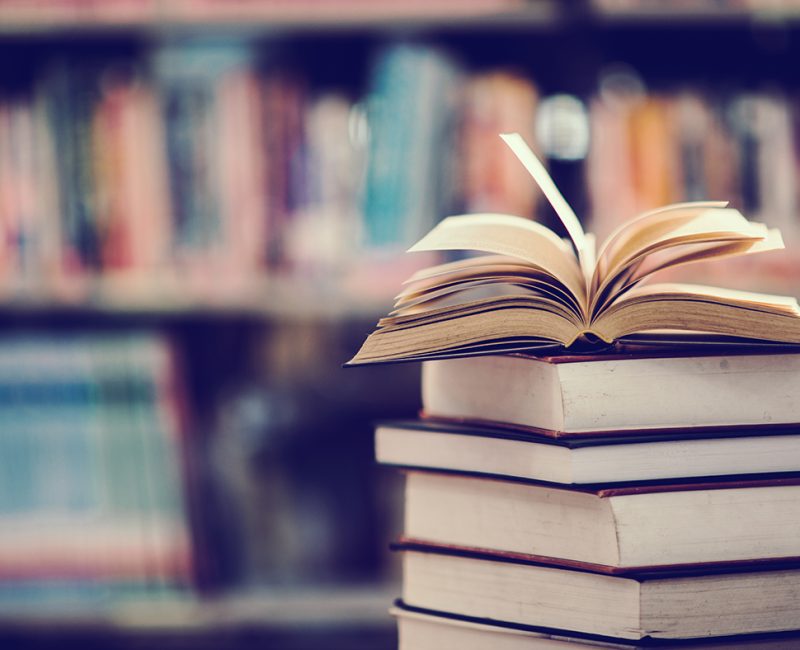 Book in library with open textbook,education learning concept